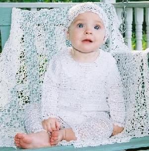 WHITE RAYON HAT, SWEATER AND CAPRI WITH LACY EDGING.