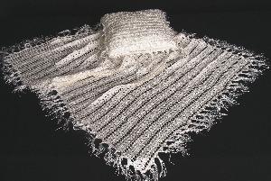 PILLOW ONLY-WHITE AND IVORY TWO TONE.