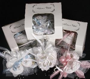 BEAUTIFULLY MADE WITH OUR BUBBLE BOOTIES, SEED PEARLS AND RIBBON.  WEAR FOR THE SHOWER AND BRING BABY HOME IN THE BOOTIES.  ADD SOME LONG RIBBONS AND USE FOR A DOOR HANGING AT THE HOSPITAL