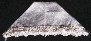 WHITE HANDKERCHIEF WITH CROCHET TRIM FOR BABY'S HAT AND LATER FOR BRIDAL BOUQUET.