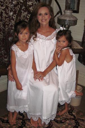 WHITE LINED COTTON CHILDREN'S GOWN WITH CROCHET TRIM COLLAR AND HEM.