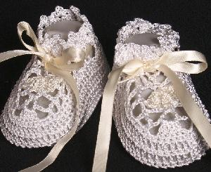 TWO TONE WHITE AND IVORY RAYON BOOTIE.  