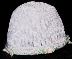 WHITE RAYON ROLL BRIM HAT WITH TINY PINK DAISY AND GREEN RIBBON EMBROIDERY.   