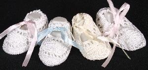 OUR MOST POPULAR BASIC BOOTIE IN WHITE RAYON WITH DIFFERENT COLOR RIBBONS.   