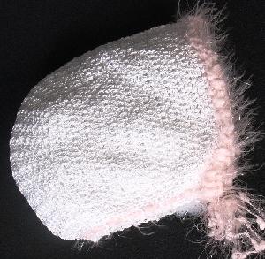 WHITE RAYON HAT WITH PINK FUZZY TRIM.  