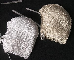 RAYON HAT EMBELLISHED WITH TINY SEED PEARLS.  AVAILABLE IN WHITE OR IVORY.   