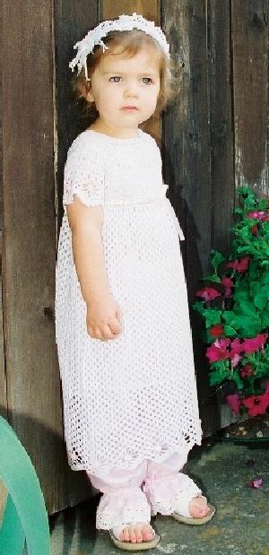 WHITE RAYON FILET CROCHET GOWN WITH TINY ROSEBUD TRIM.