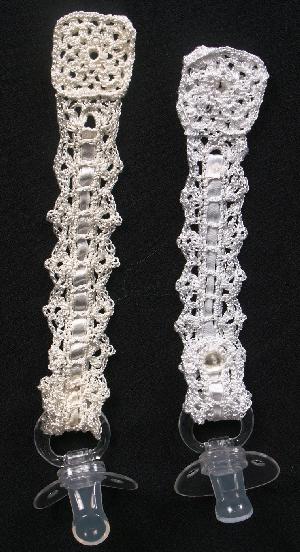 WHITE OR IVORY EMBELLISHED WITH TINY SEED PEARLS.  