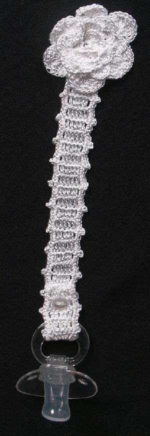 WHITE RAYON WITH CROCHETED FLOWER ON TIP.  
