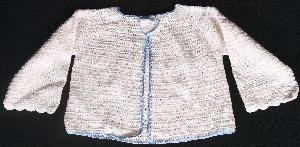 WHITE COTTON WITH BLUE TRIM AND BLUE FLAP.  