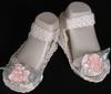 WHITE COTTON SANDAL WITH PINK ROSEBUD AND GREEN LEAVES.