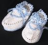 WHITE COTTON BOOTIE WITH BLUE TRIM.  