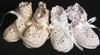 HIGH TOP RAYON BOOTIE EMBELLISHED WITH TINY SEED PEARLS.  AVAILABLE IN WHITE OR IVORY.  MATCHING PIECES; HAT, PACIFIER HOLDER.  SEE BELOW.