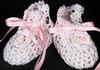 WHITE RAYON HIGH TOP BOOTIE WITH WHITE CROCHETED FLOWERS WITH PINK ROSEBUDS AND GREEN LEAVES.   