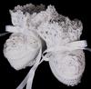 WHITE RAYON HIGH TOP BOOTIE WITH SMALL WHITE FLOWER ON TOE.
 