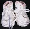WHITE RAYON HIGH TOP BOOTIE WITH TINY PINK TULIPS WITH GREEN STEMS AROUND THE TOP.  