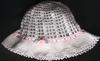 WHITE COTTON SUNHAT WITH PINK ROSEBUD AND GREEN LEAVES.   