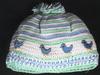 COTTON HAT WITH BLUE AND GREEN STRIPES AND LITTLE BLUE CHICS.  