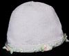 WHITE RAYON ROLL BRIM HAT WITH TINY PINK DAISY AND GREEN RIBBON EMBROIDERY.   