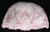 WHITE RAYON HAT WITH PINK EMBROIDERY DIAMOND DESIGN TRIM AND TINY PINK POM POMS.   