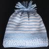 BLUE AND WHITE STRIPE COTTON HAT WITH TASSEL TOP.  