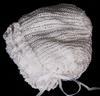 WHITE RAYON HAT WITH ROWS OF FRILLS.   