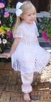 WHITE RAYON DRESS WITH PEACH STRIPES AND FLOWERS AROUND COLLAR.  