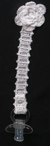 WHITE RAYON WITH CROCHETED FLOWER ON TIP.  