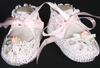 WHITE RAYON BOOTIE WITH PINK DAISY AND GREEN LEAVES.   